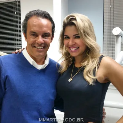Dr. Marcelo Martins com paciente atleta